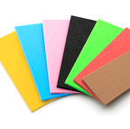 Set of colorful foam sheets in various colors on a white background