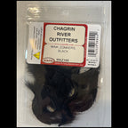 Black mink fur with a Chagrin River Outfitters label on a clear background