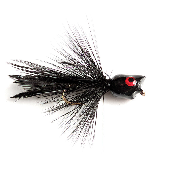 Black and red fishing popper on a white background