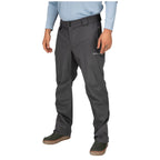 Person wearing gray Simms MEN's Waypoints Pant with a visible brand logo on a white background