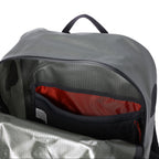 Gray Simms Dry Creek Z Backpack detail with orange 'Simms' logo on a white background
