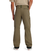 Person wearing Simms MEN's Rogue Softshell Pants on a white background