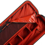 Red Simms Tailwind Rod & Reel Vault with open lid showing interior compartments on a white background