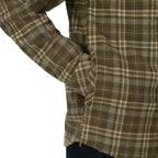 Close-up of a plaid Simms MEN's Coldweather Shacket w/CRO Logo with a white background