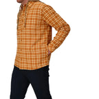 Person wearing a yellow plaid shirt on a white background