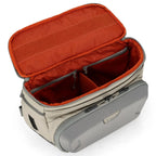 Open Simms Headwaters Sling Pack with orange interior on a white background