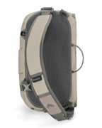 Beige and gray Simms Headwaters Sling Pack with mesh side panel on a white background
