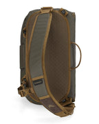 Green and brown Simms Headwaters Sling Pack with visible brand logo on a white background