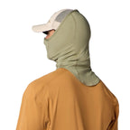 Person wearing a beige Simms Sungaiter with a brown shirt on a white background