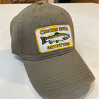 Brown cap with a logo patch on a white surface