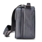 A green Orvis Carry-It-All fishing rod case with a shoulder strap and brand logo visible.