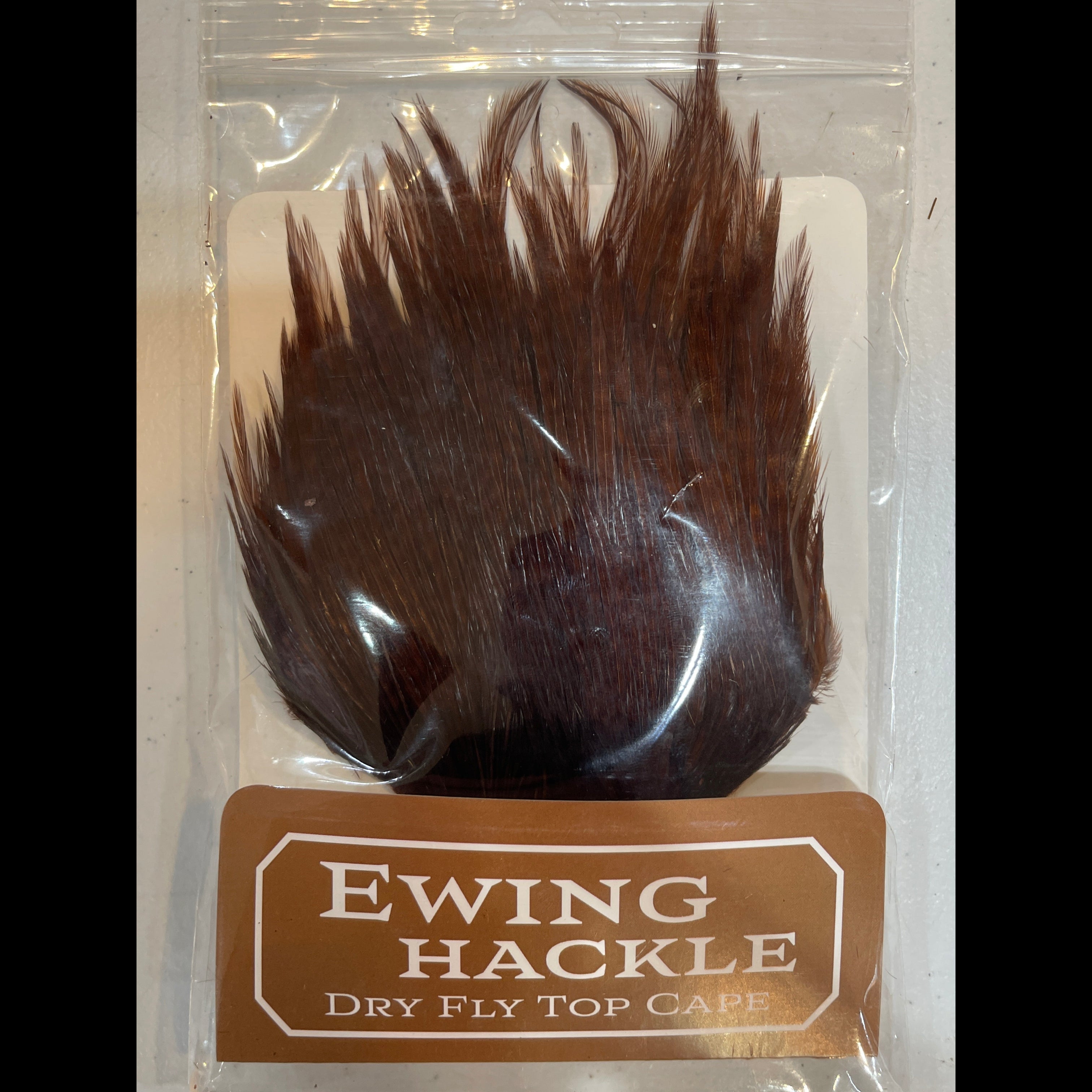 Ewing Hackle dry fly top cape packaging on a white background