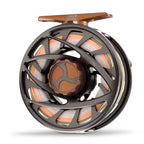 Black Orvis Mirage LT fly fishing reel  large spool and a machined aluminum handle.