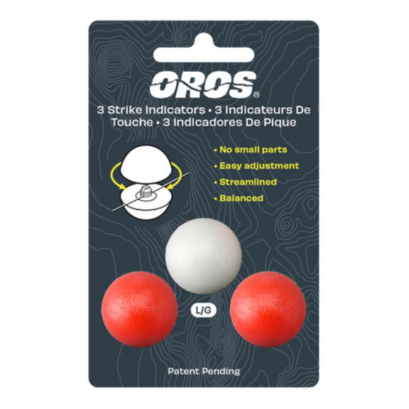 Packaging of OROS strike indicators with three balls on a dark background