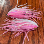 Two single stage intruder fishing flies with silver and gold accents, tied for steelhead fishing.