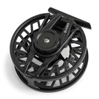 Black Orvis fishing reel on a white background