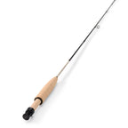 Orvis Superfine Graphite Fly Rod with a beige cork grip and a silver and black reel seat.