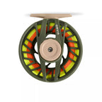 Front view of an Orvis Clearwater fly fishing reel on a white background