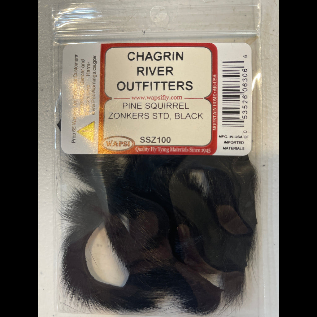 Packaged pine squirrel skin with Chagrin River Outfitters label on a white background