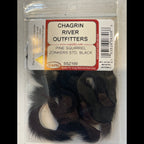 Packaged pine squirrel skin with Chagrin River Outfitters label on a white background