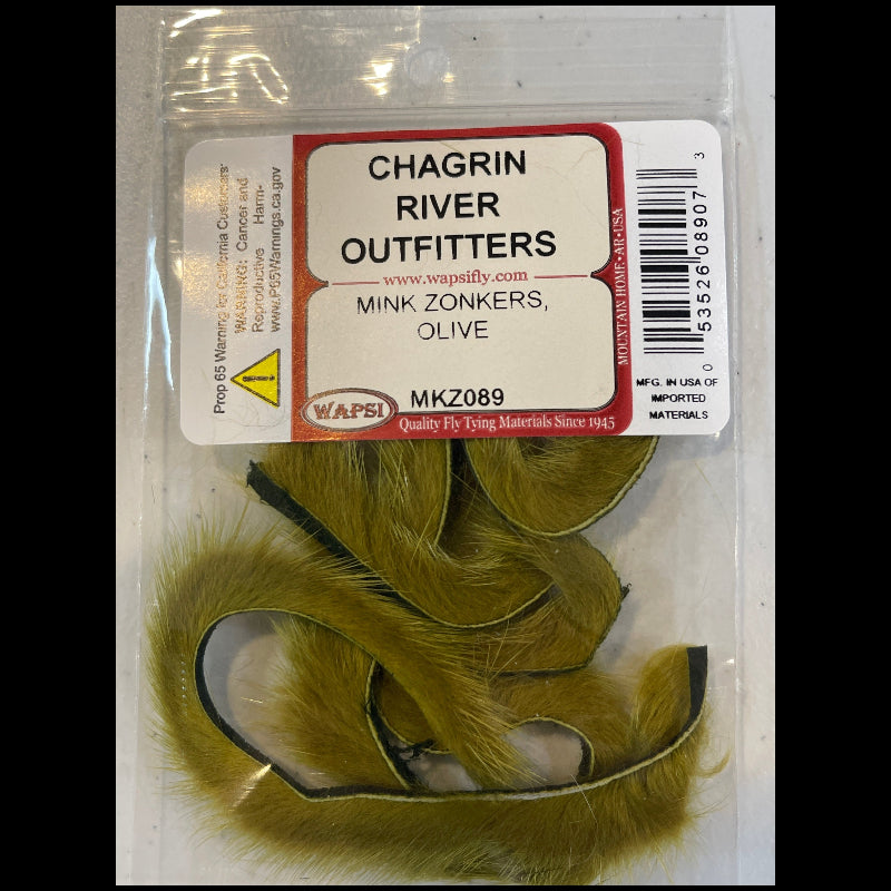 Packaged green fly fishing material with Chagrin River Outfitters label