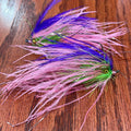 Two single stage intruder fishing flies with silver and gold accents, tied for steelhead fishing.