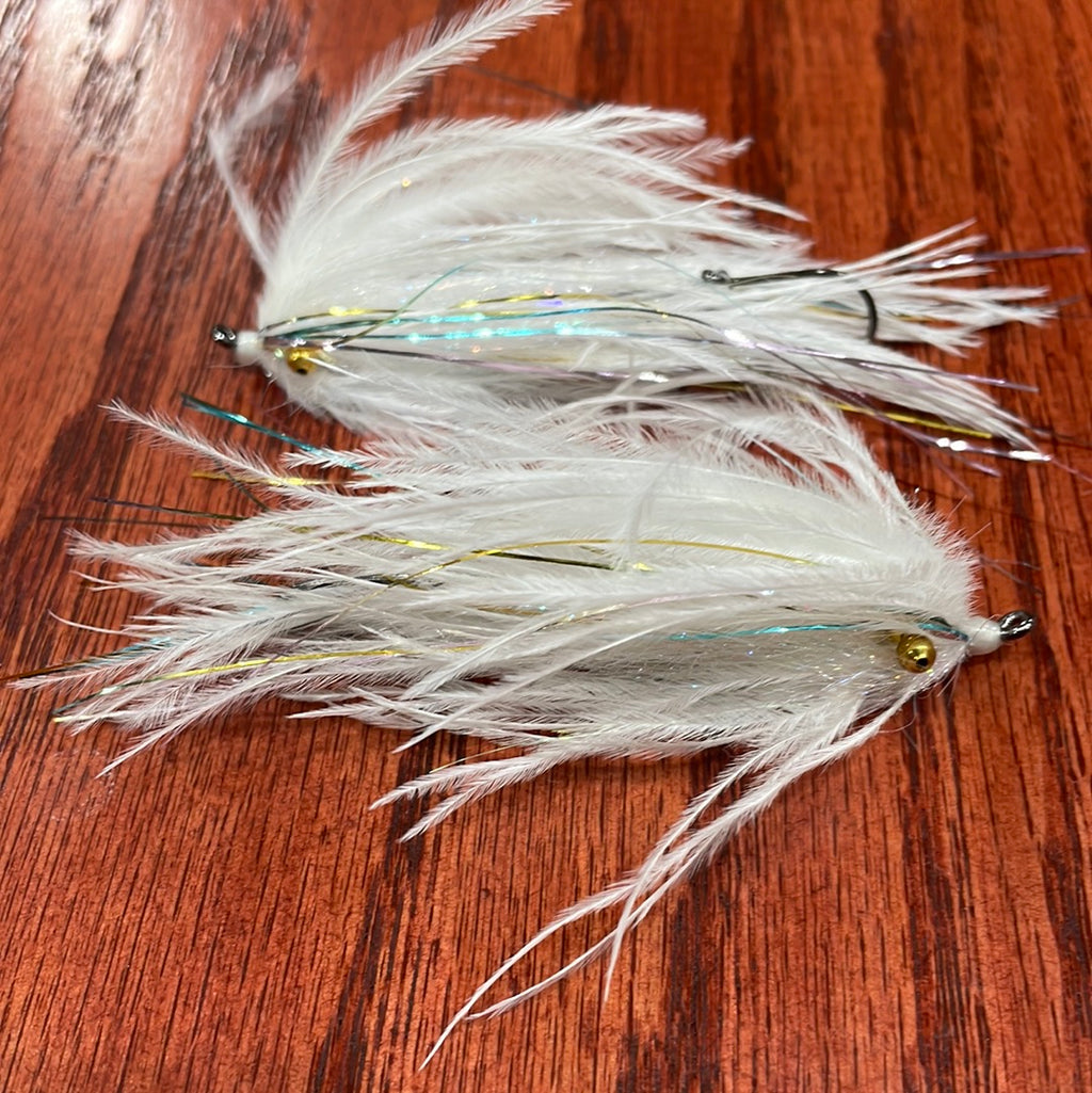 Two single stage intruder fishing flies with silver and gold accents, tied for steelhead fishing.