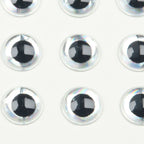 Set of black Hareline 3D Big Fish Eyes Adhesive Holographic Eyes on a white background