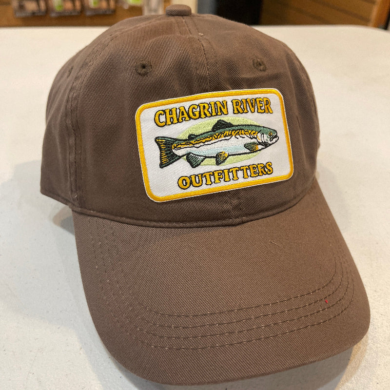 Brown cap with a logo on a white surface
