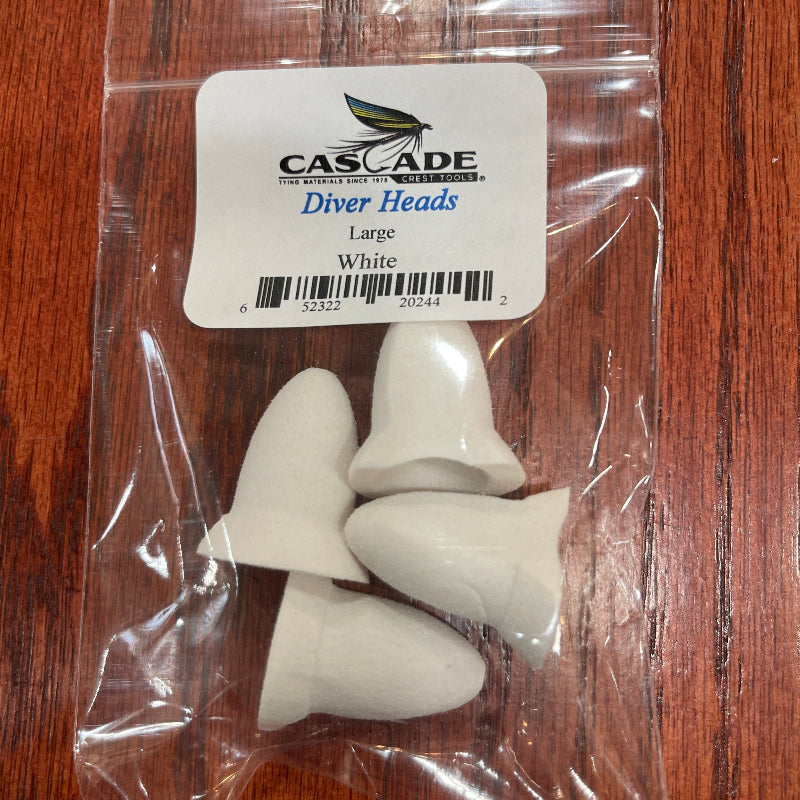 Packaged white diver heads with Cascade Diver Heads label on a wooden surface