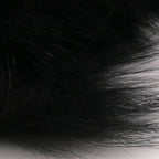 Close-up of black Hareline Arctic Fox Zonker Strips