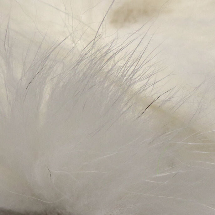 Close-up of white Hareline Arctic Fox Zonker Strips
