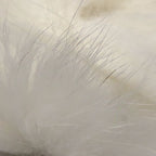 Close-up of white Hareline Arctic Fox Zonker Strips