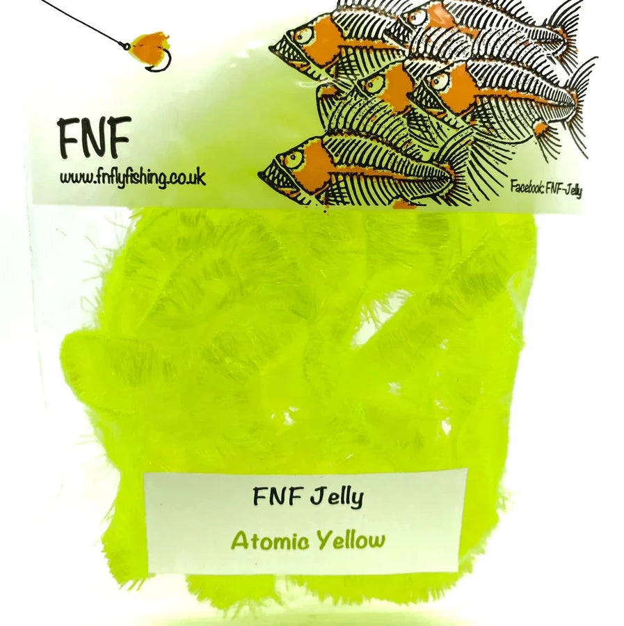 Atomic Yellow FNF fly tying material on a white background
