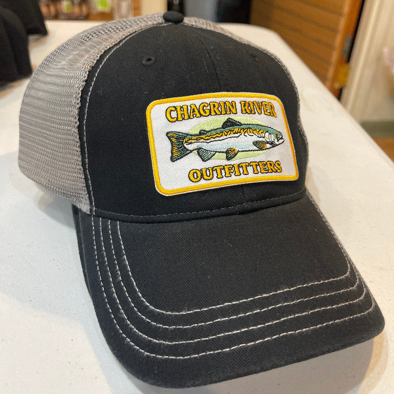 Black cap with Chagrin River Outfitters logo in an indoor setting