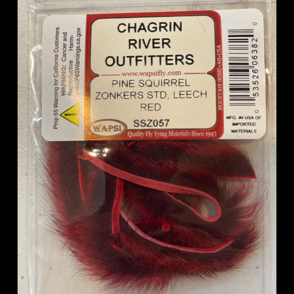 Packaged pine squirrel zonkers with a Chagrin River Outfitters label on a clear background