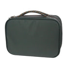 Green fly tying travel case with a handle on a white background