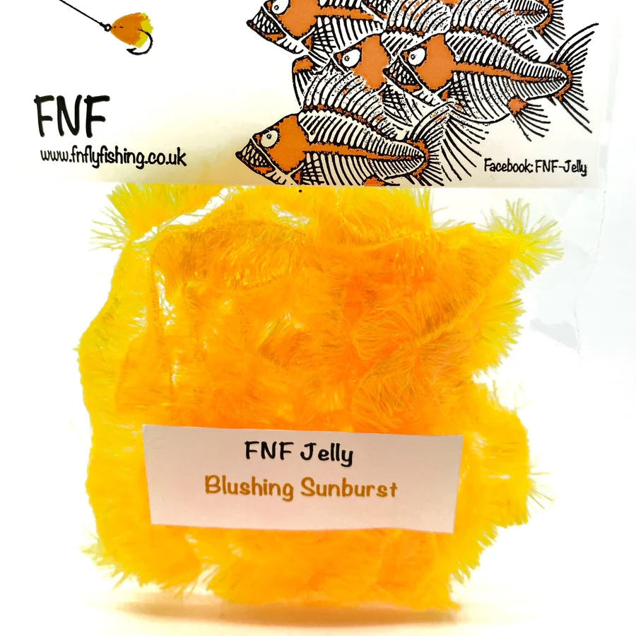 Blushing Sunburst FNF fly tying material on a white background