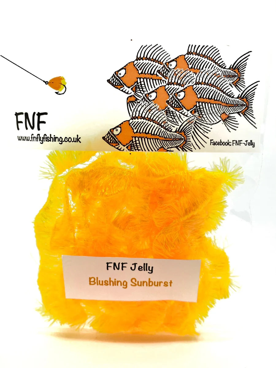 Packaged orange fishing tying material with FNF branding on a white background