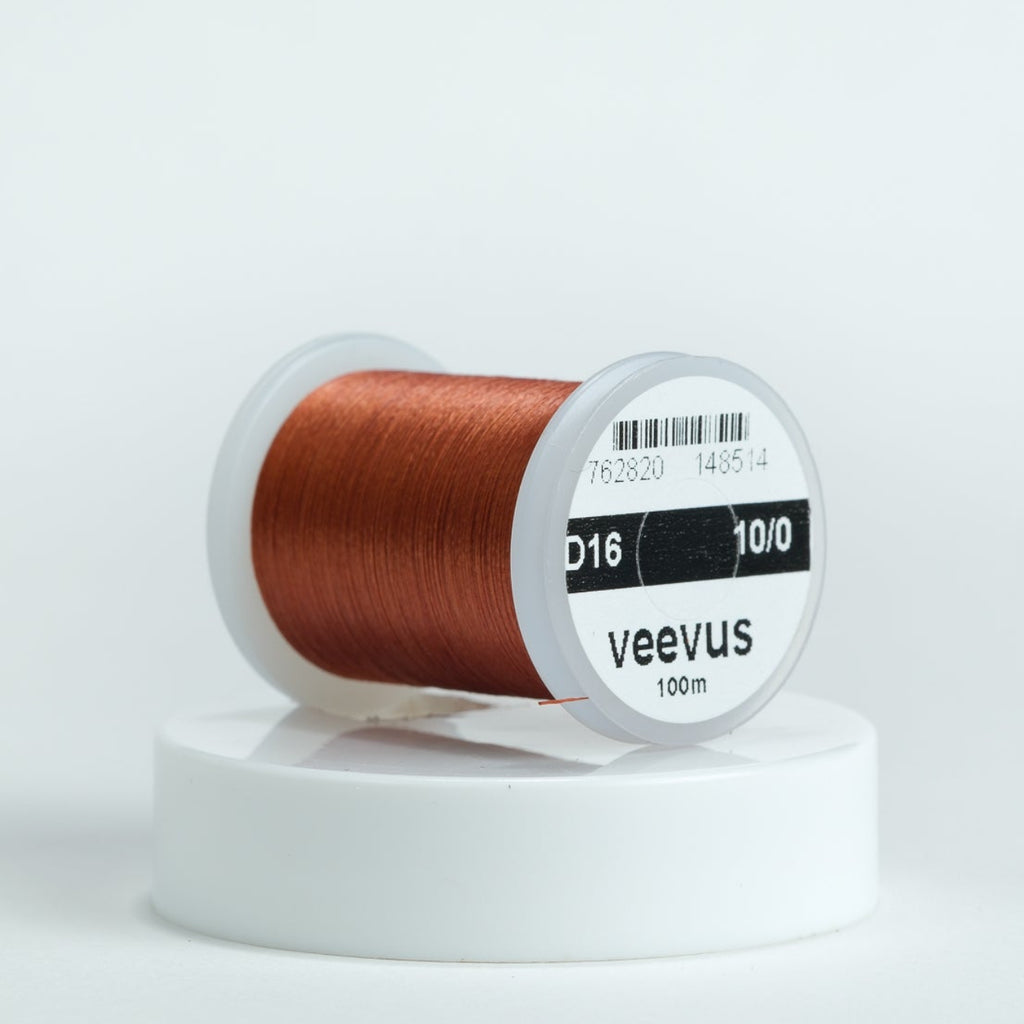 Spool of brown thread with 'veevus' branding on a white background