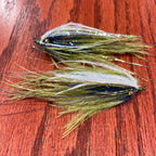 Two single stage intruder fishing flies with silver and gold accents, tied for steelhead fishing.