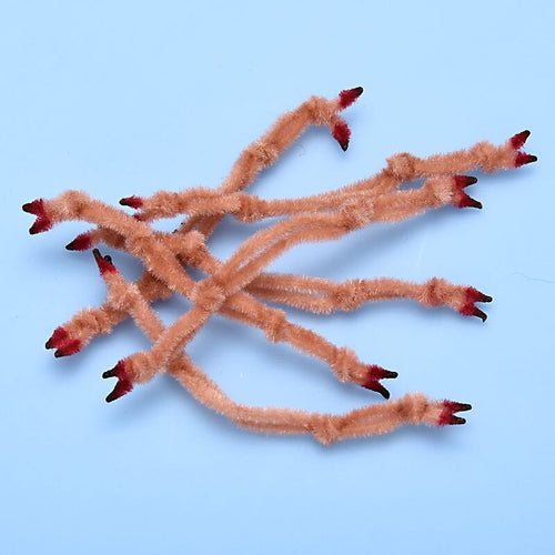 A collection of chenille crab claws arranged in a pattern on a blue background, designed for use in fly tying for fishing.