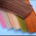Color swatches EP® Fibers Silky 3-D in various colors on a blue background