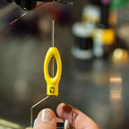 Yellow Loon Ergo All Purpose Bobbin with a blurred background