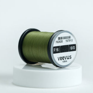 Spool of green Veevus Thread Polyester 6/0 with 'veevus' branding on a white background