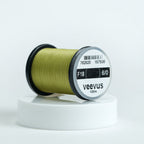 Spool of olive Veevus Thread Polyester 6/0 with 'veevus' branding on a white background