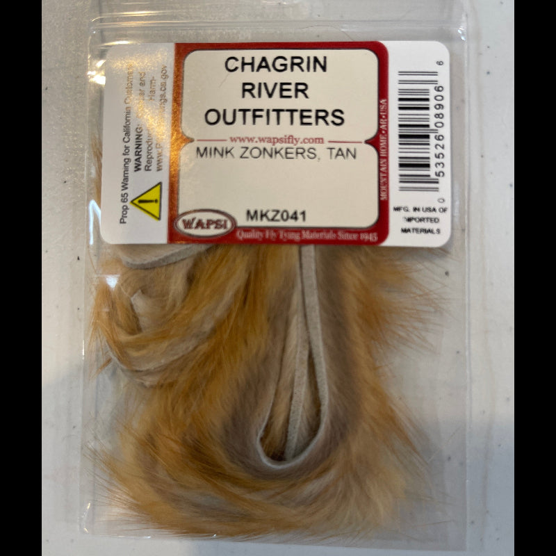 Packaged mink zonker with Chagrin River Outfitters label on a white background