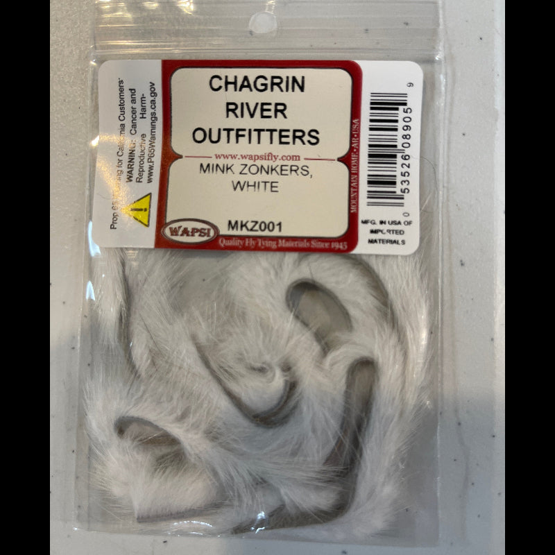 Packaged mink fur with Chagrin River Outfitters label on a white background