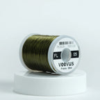 Spool of olive Veevus floss on a white background