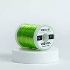 Spool of chartreuse floss thread with 'Veevus' branding on a white background